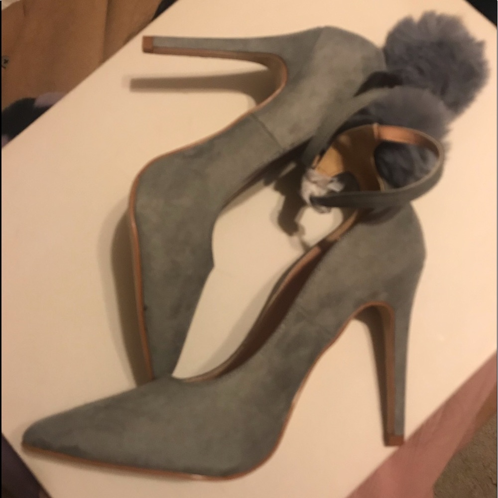Gray faux suede pump with Pom Pom on the back